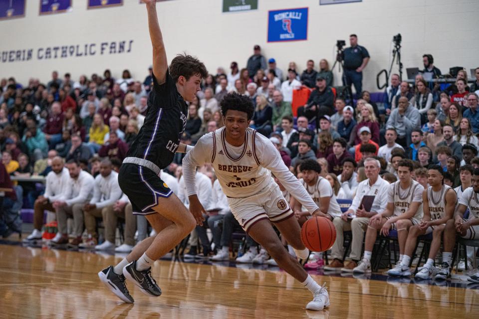 Brebeuf Jesuit senior guard Evan Haywood (1) drives to the basket during the IHSAA Class 3A Sectional Championship March 2, 2024, at Guerin Catholic High School in Noblesville, Indiana.