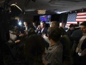Gov. John Hickenlooper is swarmed by the media at the watch party for Colorado Democrats at the Westin Hotel in downtown Denver before the polls close Tuesday, Nov. 6, 2018. (Jerilee Bennett/The Gazette via AP)