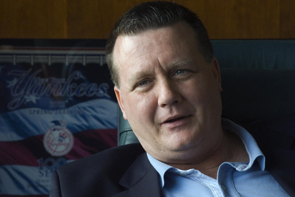 FILE - In this Jan. 24, 2008, file photo, New York Yankees general partner Hank Steinbrenner sits in his office during an interview at Legends Field in Tampa, Fla. Henry "Hank" Steinbrenner died Tuesday, April 14, 2020, at his home in Clearwater, Fla. He was 63.(AP Photo/Steve Nesius, File)