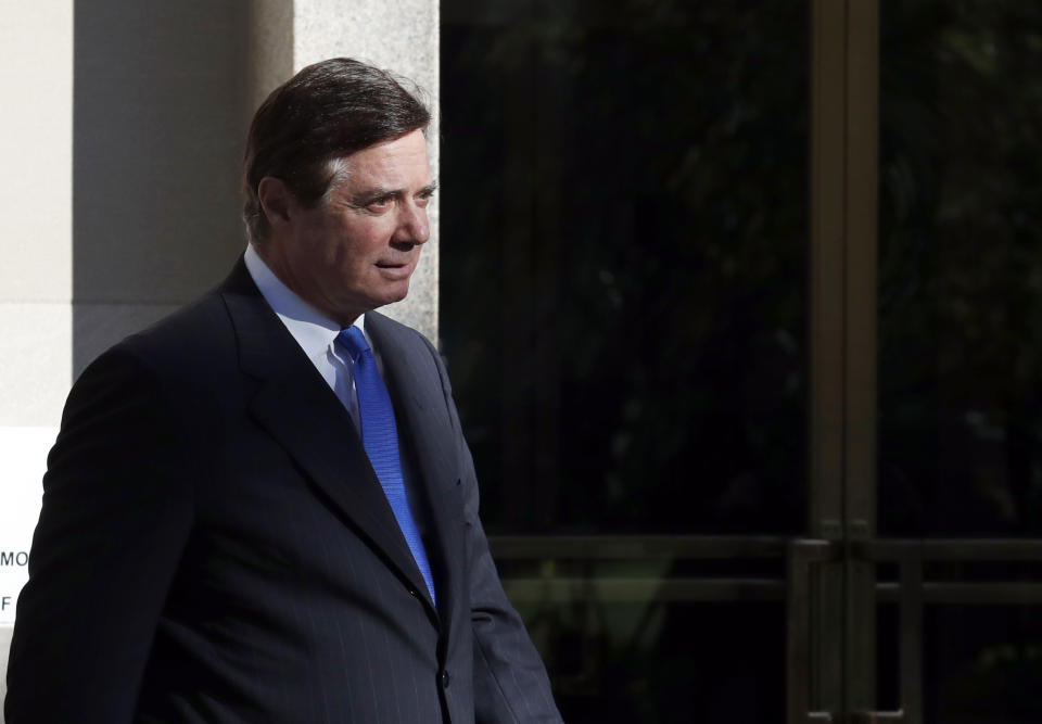 FILE- In this Oct. 30, 2017, file photo Paul Manafort leaves Federal District Court in Washington. Prosecutors in New York City are building a potential criminal case against Manafort, as he awaits sentencing on federal conspiracy and fraud convictions, according to reports published Friday, Feb. 22, 2019. (AP Photo/Alex Brandon, File)