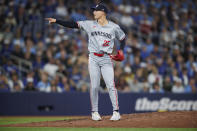 Minnesota Twins pitcher Griffin Jax point to an umpire during the ninth inning of the team's baseball game against the Toronto Blue Jays on Friday, May 10, 2024, in Toronto. (Cole Burtson/The Canadian Press via AP)