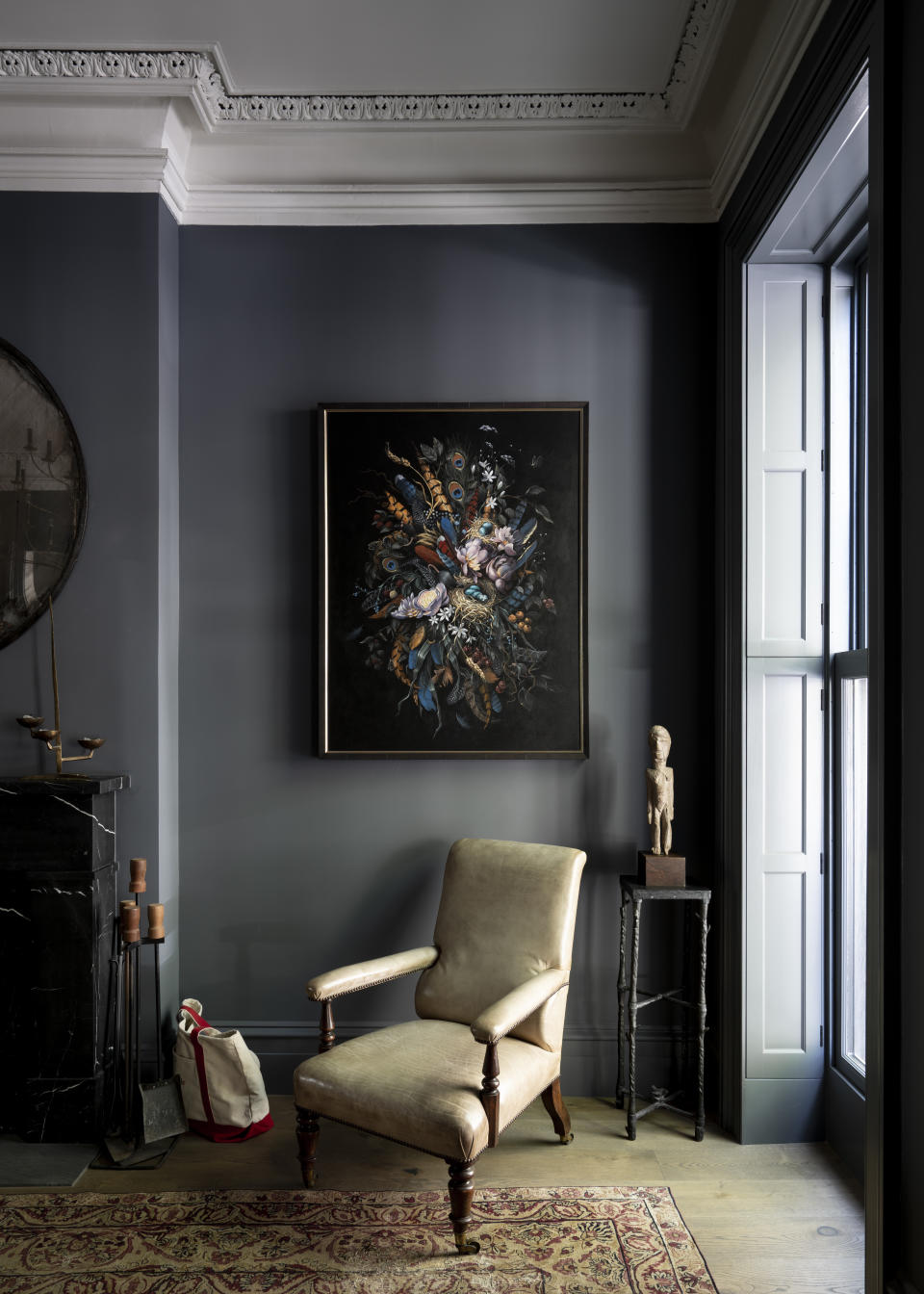 A sitting room in former Michael Kors CEO Josh Schulman’s home painted in Farrow & Ball’s Down Pipe.