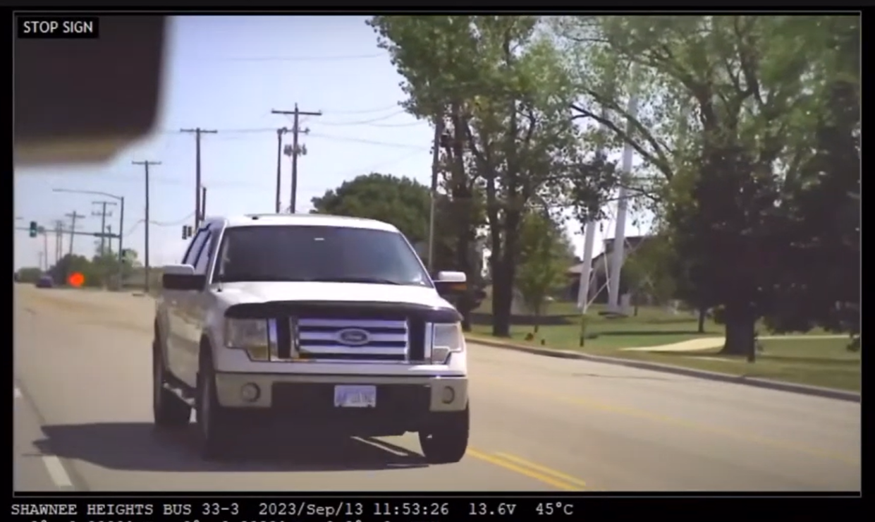 Kansas State Board of Education members watched this video of a pickup truck illegally passing a Shawnee Heights school bus as it stopped on S.E. 29th Street near S.E. Croco Road on Sept. 13, 2023.