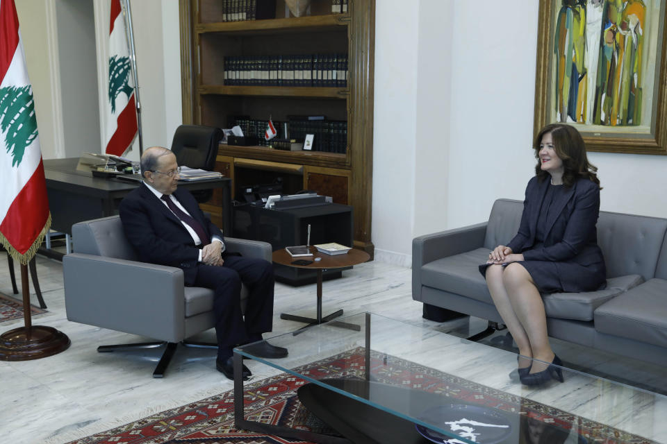 In this photo released on Thursday, June 11, 2020 by the Lebanese Government, President Michel Aoun, left, meets with U.S. Ambassador to Lebanon Dorothy Shea, at the Presidential Palace in Baabda, east of Beirut, Lebanon. A Lebanese court issued a ruling Saturday barring local and foreign media in the country from interviewing the U.S. ambassador to Beirut for a year, calling a recent interview in which she criticized the powerful Hezbollah group seditious and a threat to social peace. (Dalati Nohra/Lebanese Government via AP)