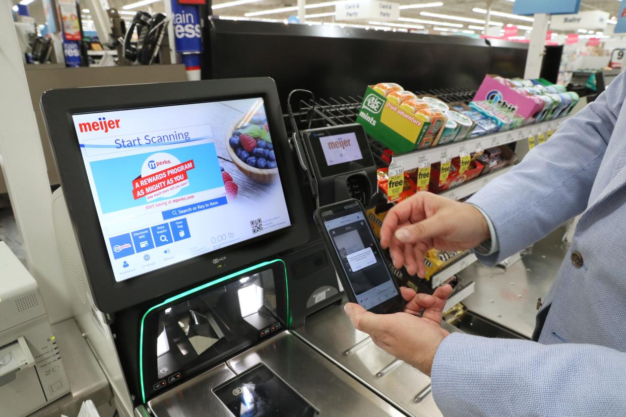 After you have scanned all the items in your cart as you buy them you head to the self checkout kiosk and checkout with the app by scanning the QR code on the machine and following the prompts. Mike Evert, store director of the Meijer in Kenosha demonstrates the shop & scan feature in the Meijer app for apple and android phones.  The Kenosha store has been using the app in a pilot program for 6 months.  Evert was at the Greenfield store on May 2, 2019 to demonstrate it. All stores will go live with it on Monday.