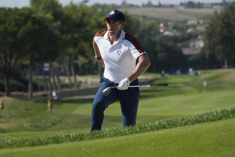 Europe's Rory Mcilroy gets out of a bunker after playing his shot on the 6th hole during his afternoon Fourballs match at the Ryder Cup golf tournament at the Marco Simone Golf Club in Guidonia Montecelio, Italy, Saturday, Sept. 30, 2023. (AP Photo/Andrew Medichini)