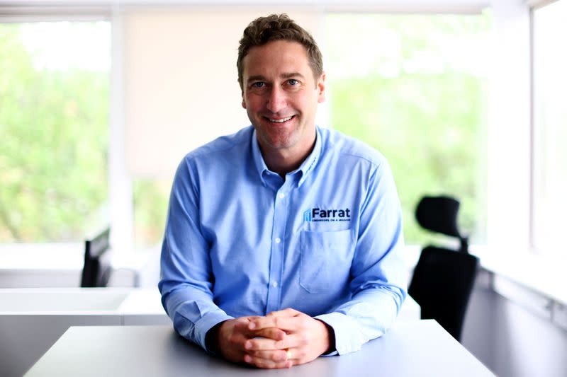 Farrat Chief Executive Officer, Oliver Farrell, sits in an office in Altrincham