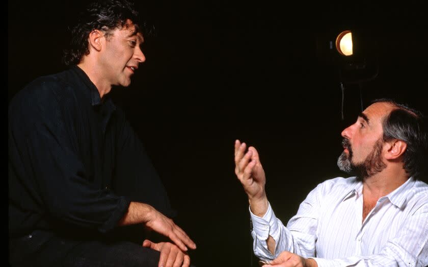 Rock musician Robbie Robertson talks with director Martin Scorsese. (Photo by Lynn Goldsmith/Corbis/VCG via Getty Images)