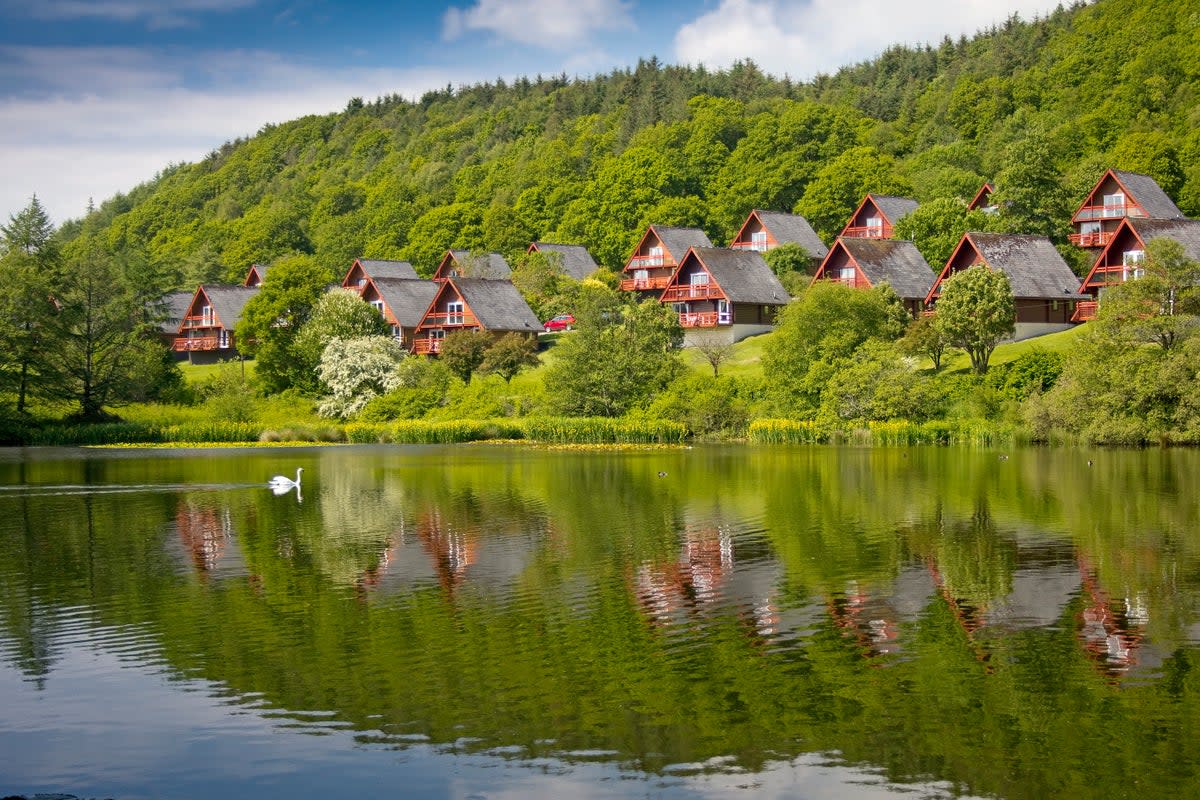 Explore an array of places to stay, from luxury lodges to lakeside log cabins  (Getty Images/iStockphoto)