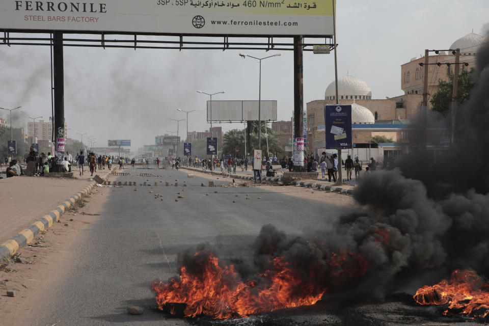 Sudanese demonstrators attend rally to demand the return to civilian rule, in Khartoum, Sudan, Thursday, Oct. 6, 2022. Sudan has been mired in political turmoil since its military seized power in a coup last October after three decades of repressive Islamist rule under former President Omar Al Bashir. (AP Photo/Marwan Ali)