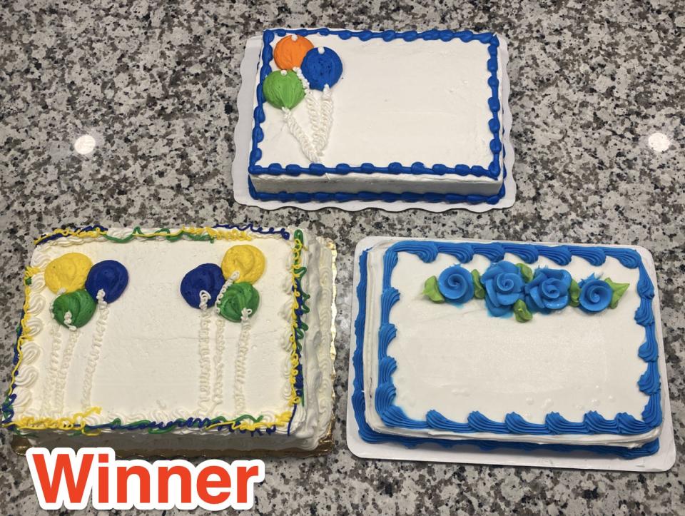 three sheet cakes with blue designs on marble counter with text "Winner" written over bottom left cake with balloons piped on it