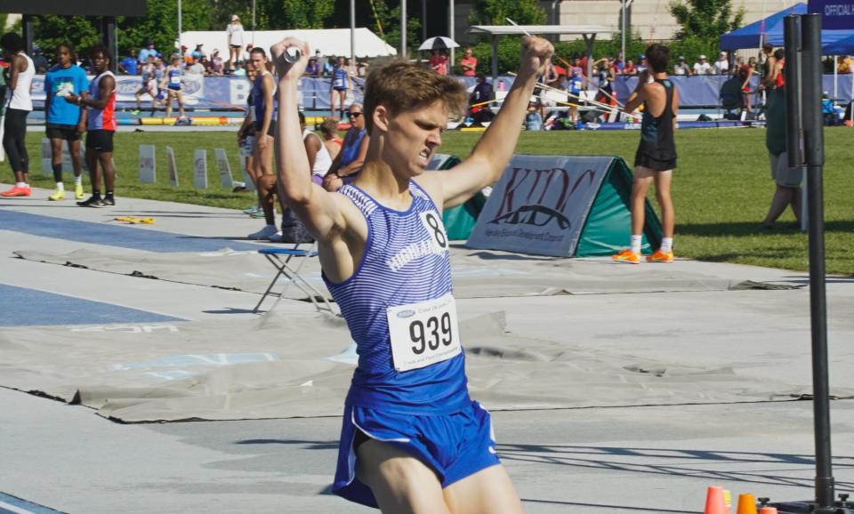 Highlands' Caden Schroeder celebrates as he crosses the line in the boys 4x800 relay at the KHSAA Class 2A track and field championships on June 2, 2023. The Bluebirds won the event in a school-record time.