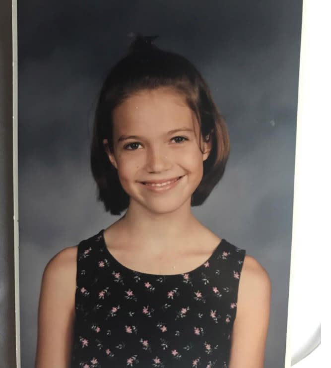 <p>She was so tiny! The adorable mini Mandy was just a few years away from fame when she cheesed it up for this one. “7th grade fake smile,” she explained. (Photo: <a rel="nofollow noopener" href="https://www.instagram.com/p/BYLp7e9He-U/?hl=en&taken-by=mandymooremm" target="_blank" data-ylk="slk:Mandy Moore via Instagram;elm:context_link;itc:0;sec:content-canvas" class="link ">Mandy Moore via Instagram</a>) </p>