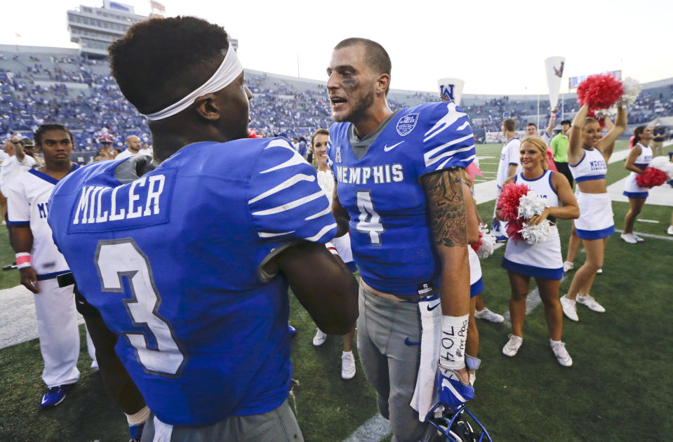 Memphis quarterback Riley Ferguson (4) and wide receiver Anthony Miller (3) have put up huge numbers this season. (AP Photo/Mark Humphrey, File)