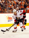 PHILADELPHIA, PA - MARCH 31: Erik Karlsson #65 of the Ottawa Senators moves the puck against the Philadelphia Flyers at Wells Fargo Center on March 31, 2012 in Philadelphia, Pennsylvania. (Photo by Rob Carr/Getty Images)