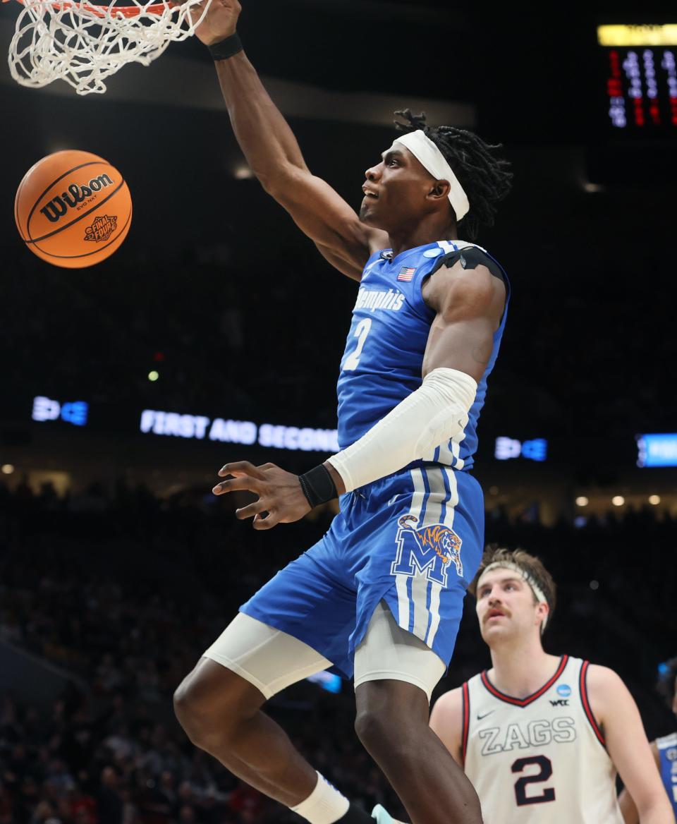 Memphis center Jalen Duren dunks against Gonzaga during the second round of the NCAA tournament March 19 at the Moda Center in Portland, Oregon.