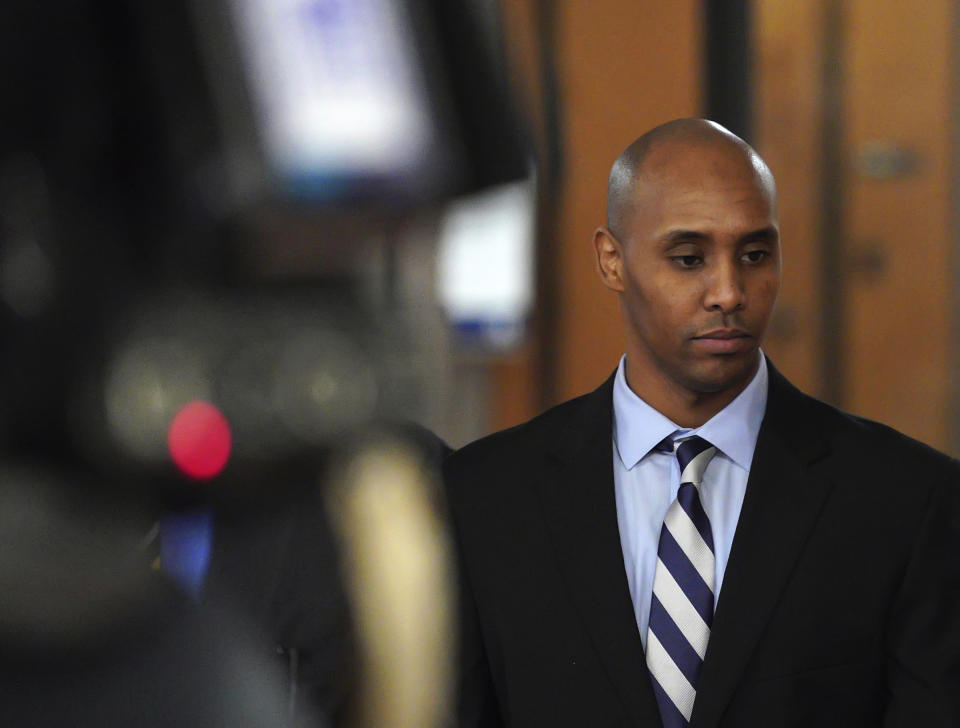 FILE - In this April 25, 2019, file photo, former Minneapolis police Officer Mohamed Noor walks out of the Hennepin County courthouse in Minneapolis. Prosecutors fought hard to add a third-degree murder charge against former Officer Derek Chauvin in the death of George Floyd, but a conviction on that charge alone could set up a problematic scenario for them. The interpretation of Minnesota’s third-degree murder statute is being challenged by Noor, who was found guilty in a deadly 2017 shooting. If Noor's conviction is thrown out, a Chauvin conviction could collapse, too. (Brian Peterson/Star Tribune via AP, File)