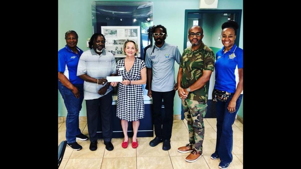 Attending The Villagers grant presentation ceremony at the Black Police Precinct and Courthouse Museum are, from left, Sgt. Deborah Payne, Black Police Museum (BPM) Board Parliamentarian; Lt. James Marshall, Jr., BPM Board President; Kelley Schild, Villagers’ 1st Vice President; Terrance Cribbs-Lorrant, Museum Director/Curator; Sgt. Erol Stewart Jr., BPM Board Vice President; and Chief Anita Najiy, BPM Board Treasurer and Girl Scout Troop 1877 Leader. Board members of the Black Police Museum are all former City of Miami Police Officers.

