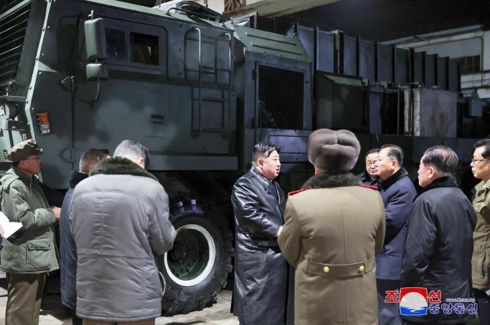 North Korean leader Kim Jong-un visits a munitions factory at an undisclosed location (via REUTERS)