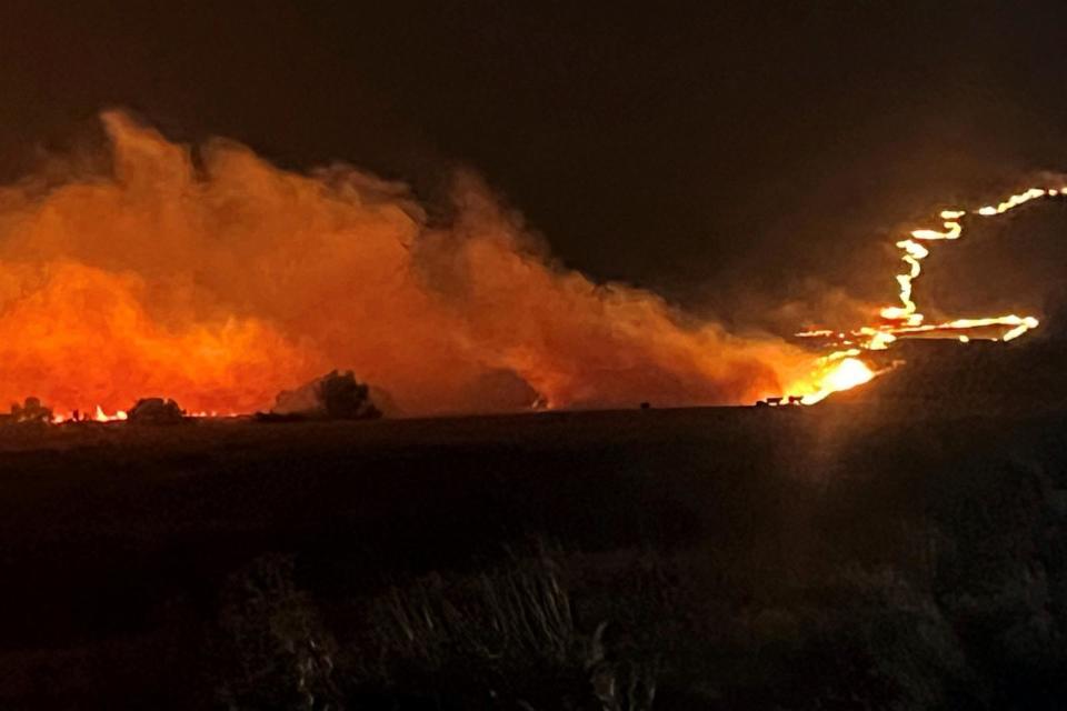 PHOTO: This photo provided by the Oregon Department of Transportation shows the Durkee Fire burning in eastern Ore., July 22, 2024. (Oregon Department of Transportation via AP)