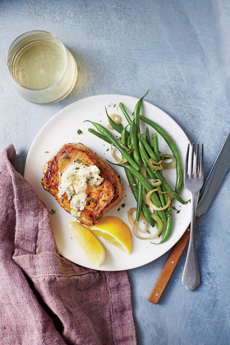 Pork Chops with Herbed Goat Cheese Butter and Green Beans