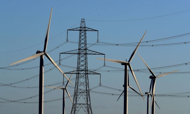 A pylon near a wind farm