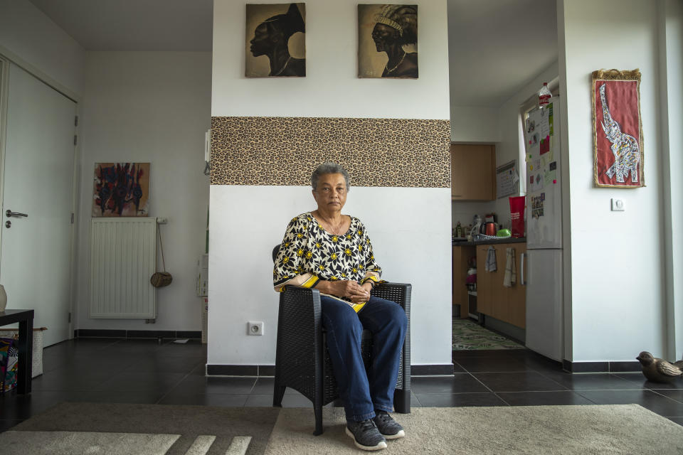 In this photo taken on Monday, June 29, 2020, Belgium's Noelle Verbeeken poses for a photograph during an interview with The Associated Press in Brussels. Verbeeken is part of a group of biracial women who were taken from their families as children in Belgian Congo and placed in a religious mission run by Catholic nuns who have now filed a lawsuit seeking reparations from Belgium. (AP Photo/Francisco Seco)