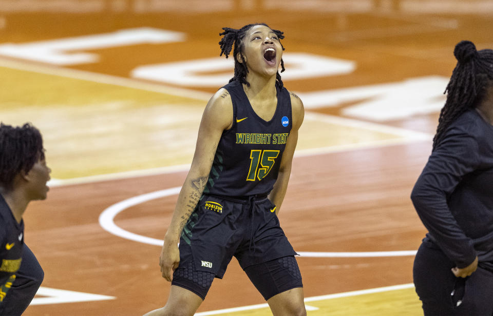 Wright State guard Angel Baker celebrates a win over Arkansas in a college basketball game in the first round of the women's NCAA tournament at the Frank Erwin Center in Austin, Texas, Monday, March 22, 2021. (AP Photo/Stephen Spillman)