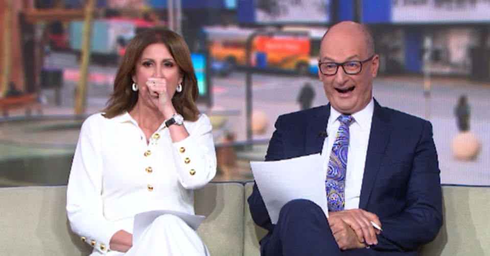 Nat Barr and David Koch with shocked expressions in the Sunrise studio.