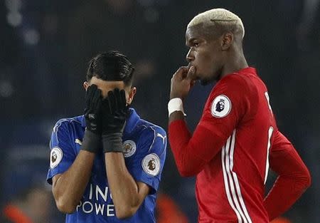 Britain Soccer Football - Leicester City v Manchester United - Premier League - King Power Stadium - 5/2/17 Manchester United's Paul Pogba and Leicester City's Riyad Mahrez after the game Reuters / Darren Staples Livepic