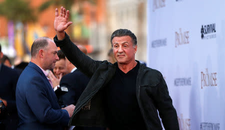 Actor Sylvester Stallone waves at the premiere of "The Promise" in Los Angeles, California, U.S., April 12, 2017. REUTERS/Mario Anzuoni