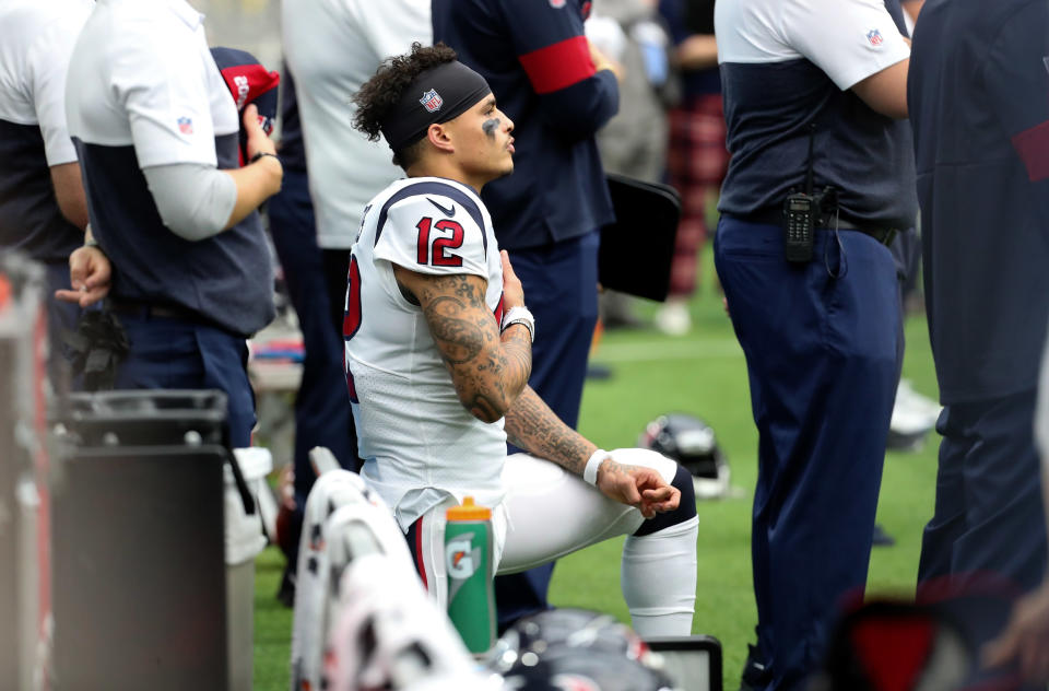 Houston wide receiver Kenny Stills kneels during the national anthem before a September game in 2019. (Kevin Jairaj/USA TODAY Sports)