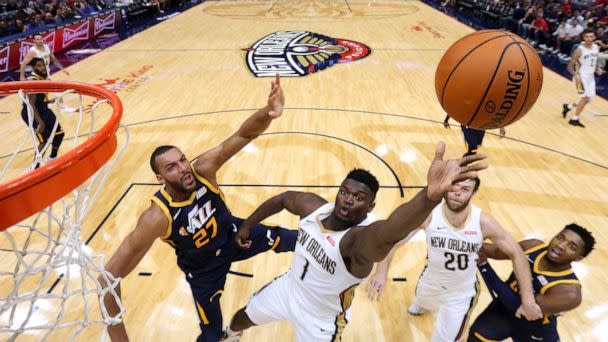 PHOTO: Zion Williamson #1 of the New Orleans Pelicans shoots against Rudy Gobert #27 of the Utah Jazz during the second half of a game at the Smoothie King Center on October 11, 2019 in New Orleans, Louisiana. (Jonathan Bachman/Getty Images)