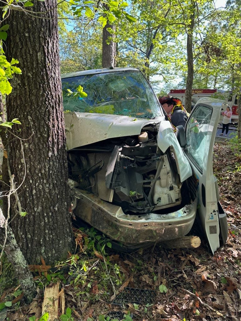 A van carrying children and one adult is pictured after crashing into tree just outside of Pinson, Alabama on its way to Kermit Johnson Elementary School.