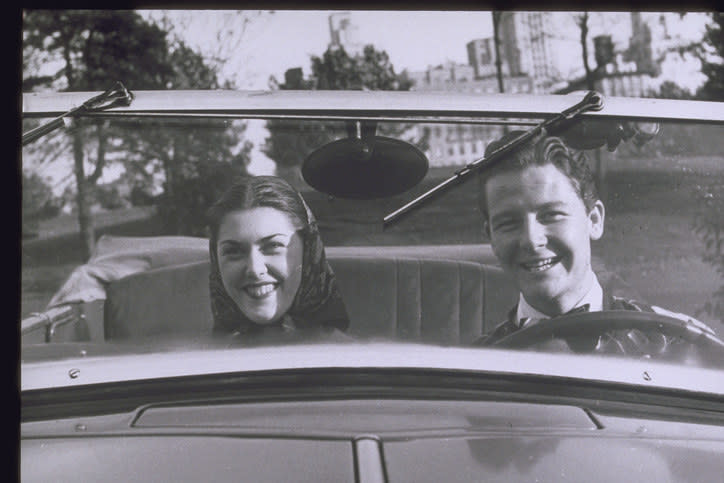 old photo of a couple in a car