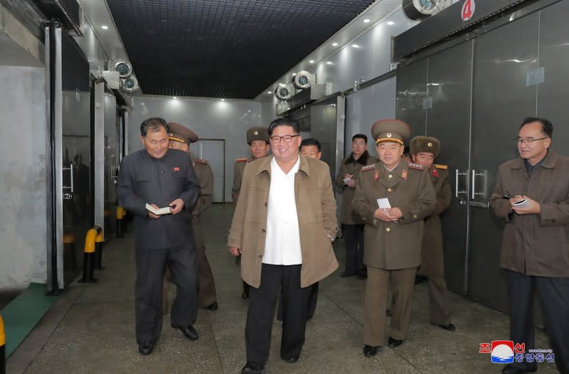 North Korean leader Kim Jong Un visits a fish processing facility in North Korea