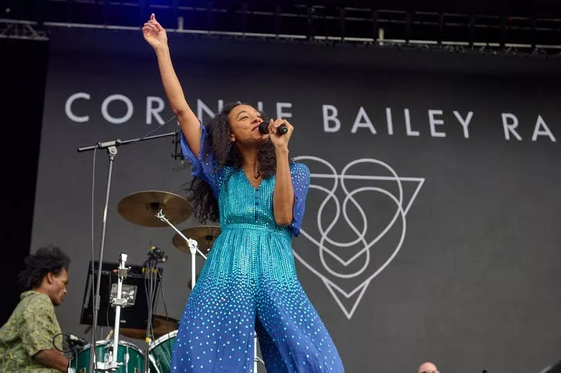 Singer Corinne Baillie-Rae performing on stage in Cambridge in June 2022