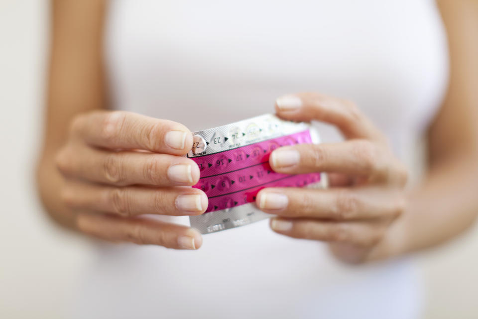 It’s unlikely that your birth control pill is causing the number on the scale to creep up. (Photo: Getty Images)