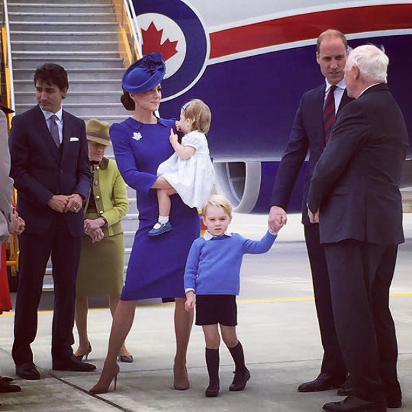 <p>According to royal protocol, two heirs shouldn’t fly on the same flight together, to protect the royal lineage in case there’s an accident. Morbid, but … practical? Prince William has defied this order on previous occasions, such as when he and the Duchess of Cambridge took George and Charlotte on a tour of Canada last year. (Photos: Getty Images) </p>