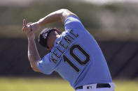 Seattle Mariners' Jarred Kelenic stretches during baseball spring training Thursday, Feb. 25, 2021, in Peoria, Ariz. (AP Photo/Charlie Riedel)