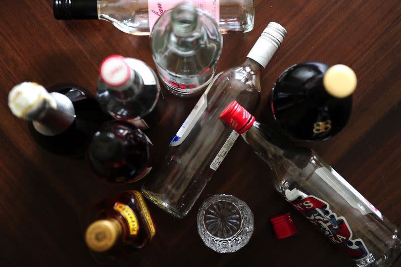 File photo of empty bottles of alcohol