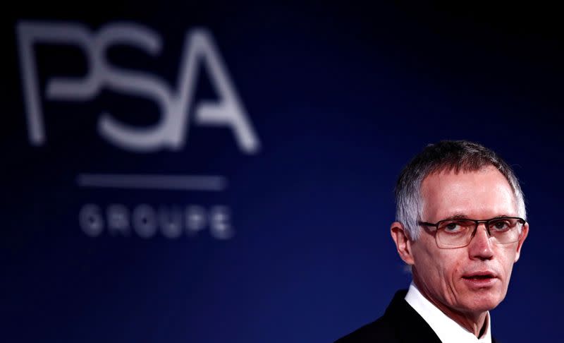 FILE PHOTO: Carlos Tavares, Chief Executive Officer and Chairman of the Managing Board of PSA Group, attends a news conference to announce the company's 2018 results at their headquarters in Rueil-Malmaison