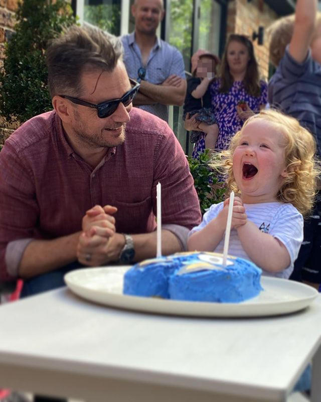 Edwina Bartholomew&#39;s daughter Molly was thrilled with her Bluey cake at her second birthday party. Photo: Instagram/edwina_b.