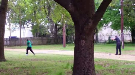 North Charleston police officer Michael Slager is seen shooting 50-year-old Walter Scott in the back as he runs away, in this still image from video in North Charleston, South Carolina taken April 4, 2015. REUTERS/Handout