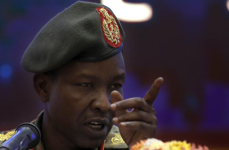 Sudan's ruling Military Council spokesperson Shamseddine Kabbashi, gestures during a press conference at the Presidential Palace, in Khartoum, Sudan, Sunday, June 23, 2019. Sudan's protest movement accepted an Ethiopian roadmap for a civilian-led transitional government, a spokesman said on Sunday, after a months-long standoff with the country's military rulers. (AP Photo/Hussein Malla)