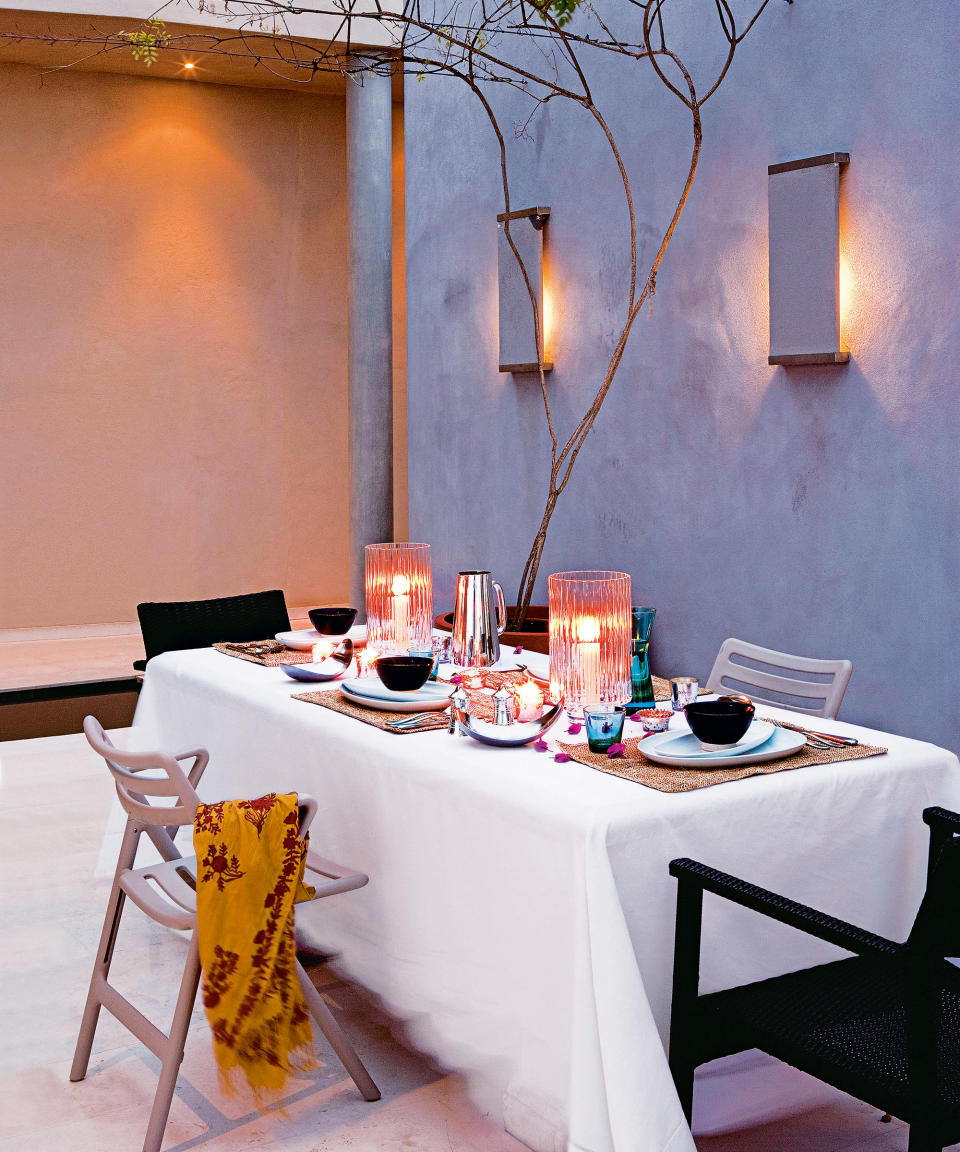 23. Complement a contemporary patio with wall lights