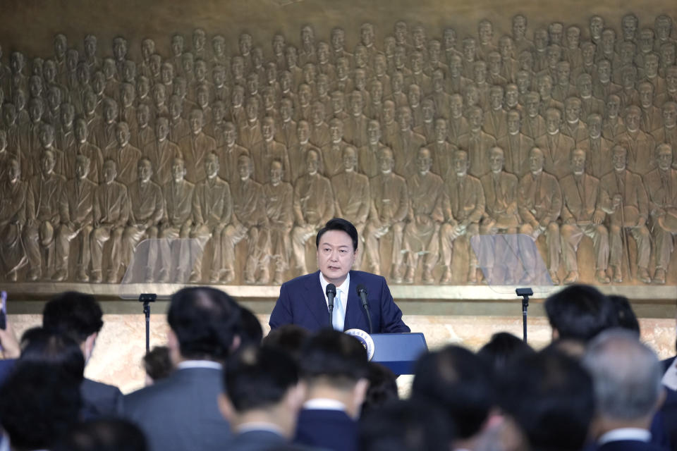 South Korea's new President Yoon Suk Yeol speaks during the 20th Presidential inaugural reception at the National Assembly in Seoul, South Korea, Tuesday, May 10, 2022. (AP Photo/Lee Jin-man, Pool)