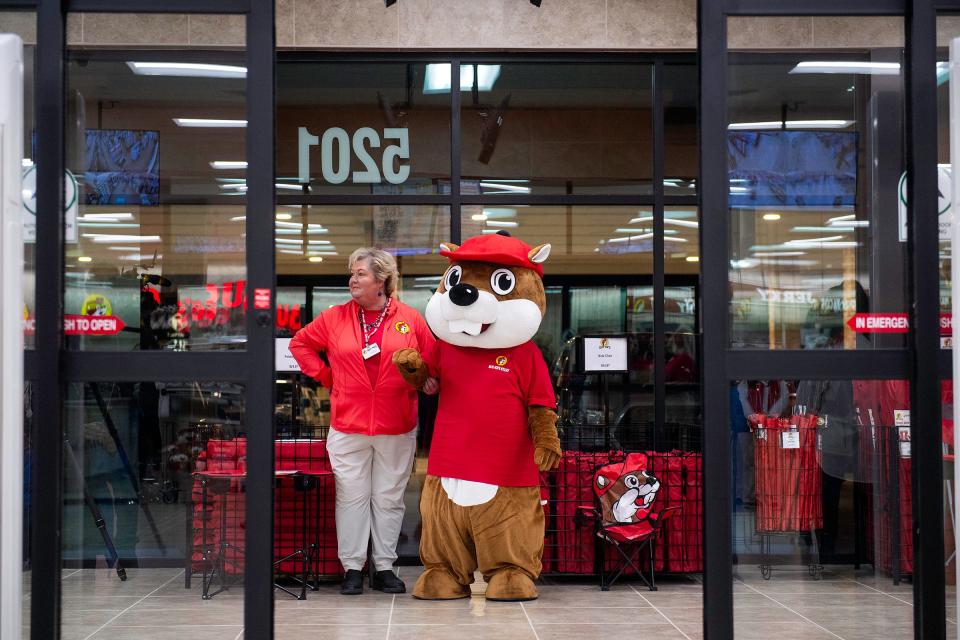 Buc-ee the Beaver waits for people to come in before the grand opening of Buc-ee's in Johnstown on Monday.