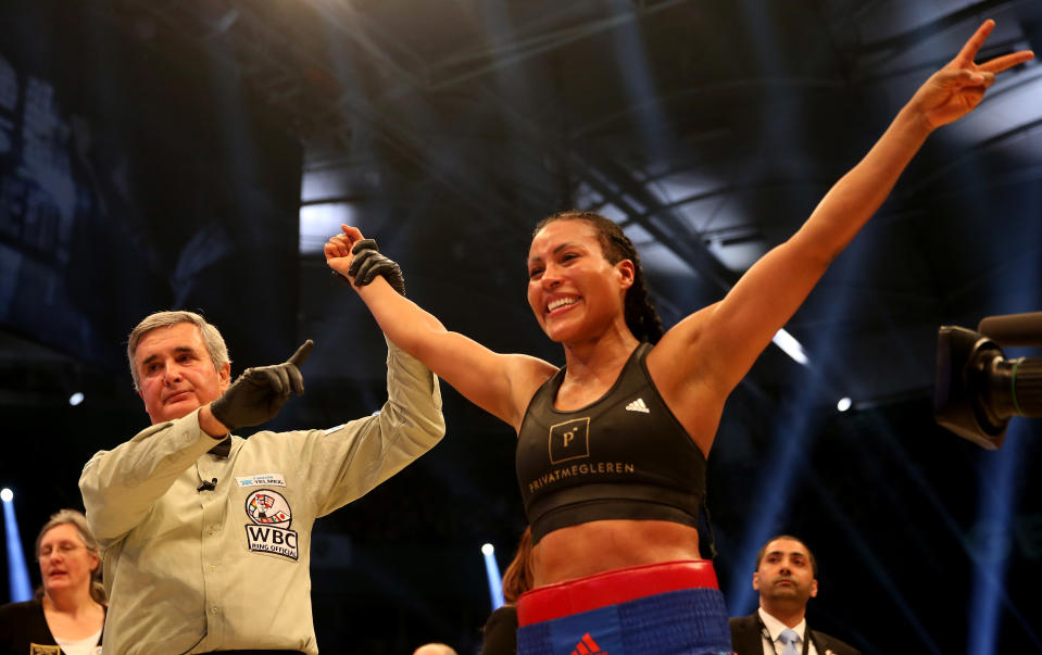 HALLE, GERMANY - FEBRUARY 27: Cecilia Braekhus celebrates after her Welterweight World Championship fight against Chris Namus prior to the IBO Cruiserweight World Championship fight between Marco Huck and Ola Afolabi at Gerry Weber Stadium on February 27, 2016 in Halle, Germany. (Photo by Lars Baron/Bongarts/Getty Images)