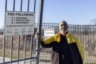 Ben Eaton, a Perry County (Ala) Commissioner stands at the entry of Arrowhead Landfill on Monday, Feb. 22, 2021 in Uniontown, Ala. Disadvantaged communities in America are disproportionately affected by pollution from industry or waste disposal, but their complaints have few outlets and often reach a dead end. Hundreds of discrimination claims sent to the Environmental Protection Agency’s civil rights office since the mid-90s have only once resulted in a formal finding of discrimination. And some cases languished for years — or decades. (AP Photo/Vasha Hunt)